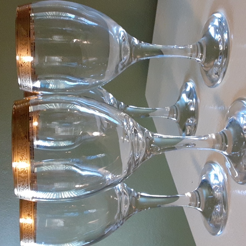 Gold trimmed wine goblets,  7 ( inches from top to bottom count 3(one broken)